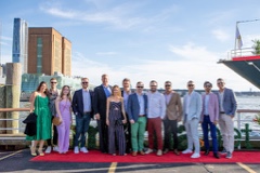 Group photo of Media.net team and guests on the dock before boarding the yacht for the Cannes on the Hudson party.