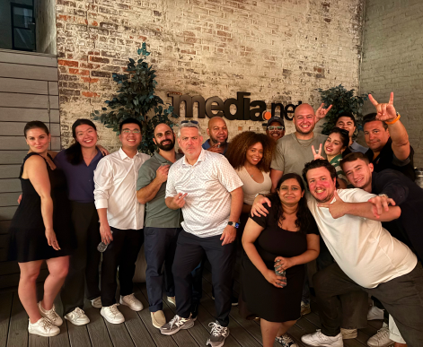 Media.net employees and clients at a hosted event in NYC.